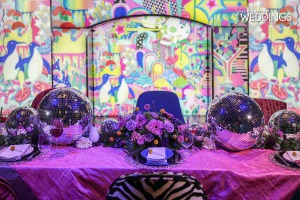 Disco inspired wedding decor with vibrant colors and mood lighting in Las Vegas