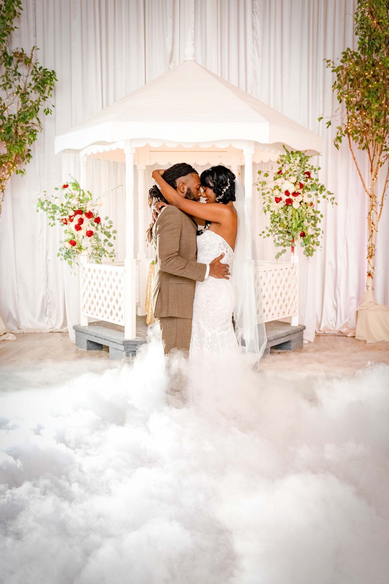 Las Vegas DJ Company, Knight Sounds Entertainment offers Dancing on the Clouds. The bride and groom dance romantically while the dance floor looks to be covered in clouds or fog